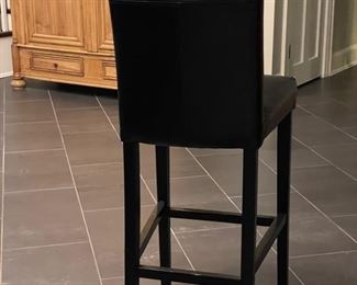 Set of three black leather bar stools. 32" H seat height. Photo 2 of 2.