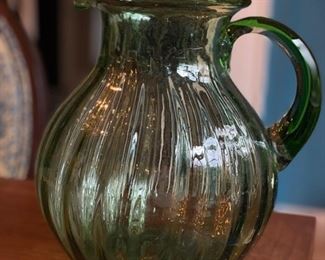 Green glass pitcher.
