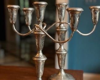 Pair of sterling silver weighted candelabras. Photo 1 of 3.