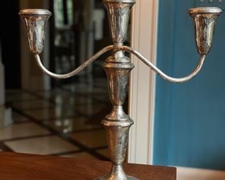 Pair of sterling silver weighted candelabras. Photo 2 of 3.