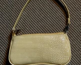 Yellow faux leather handbag.