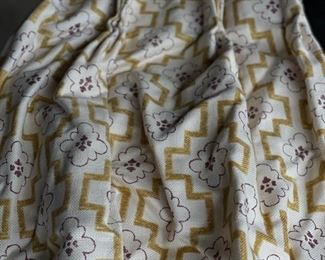 Two curtain panels. Each measures 96" L x 50" W.