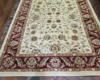 5'3" by 7'6" Safavieh oriental rug. Like new condition