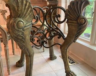 Unique "Roman Inspired", lion leg kitchen table with a thick square glass top and 4 studded cane back chairs