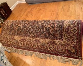 #25	Machine made 8x10 navy/burgandy/cream rug	 $100.00 
