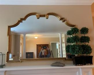 #27	Gold framed arched mirror 53x38	 $200.00 
