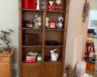 #76	Wood 2 door 4 shelf bookcase with bamboo columns 34x13x77	 $125.00 

