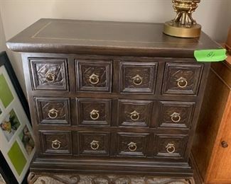 #81	Chest of Drawers with 12 small drawers metal base leather top 32x18x35	 $175.00 
