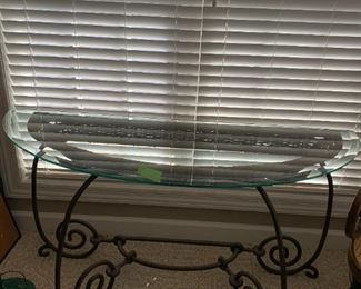 #92	Half round beveled glass top sofa table wicker and iron base	 $125.00 
