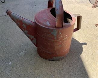 #113	Red Metal Watering Can - 13" Tall	 $20.00 
