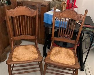 #171	(2) Sold as a set Dining Chairs w/wood Carving on Top w/cane Seating	 $45.00 
