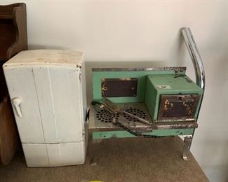 #174	Vintage Metal Refrigerator 14" Tall/Stove - sold as a set	 $45.00 
