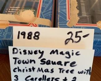 #198	disney magic town square christmas tree with 3 caroller and 2 town sq lighting systems 1988	 $25.00 
