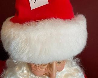 #323	christmas	tall santa with ceramic face and body 	 $50.00 	
