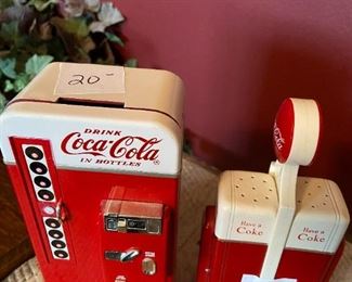 #325		coca-cola metal machine bank 	 $20.00 	
#326		Coca cola salt and pepper stand 	 $25.00 	
