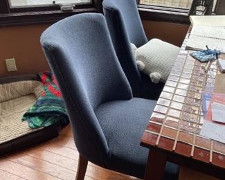 . . . two accent chairs in blue tone