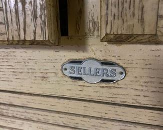 Sellers tag on hoosier kitchen cabinet