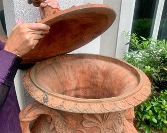 pair of matching terra cotta covered urns, approx 5’ tall