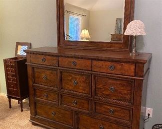 Matching dresser and mirror. Very nice deep drawers and solid wood. This furniture will last for years! Very well made. 
Jewelry armoire. 