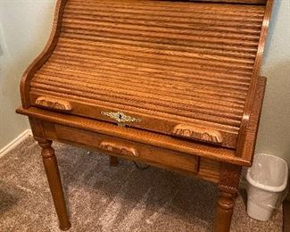 Nice little roll top writing desk. 
