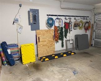 Garage- card table , folding chairs, holiday decorations,  urn stoppers, beach chairs, folding chairs