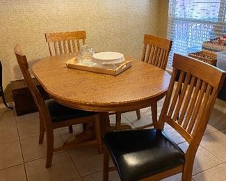 Nice solid wood dining table & 4 chairs
