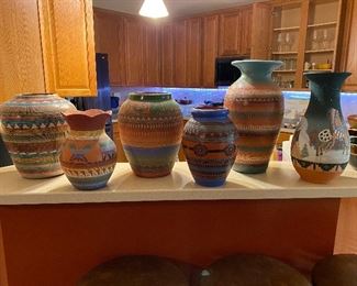 Navajo pottery & one Sioux piece 