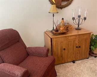 Burgundy recliner & sewing cabinet closed