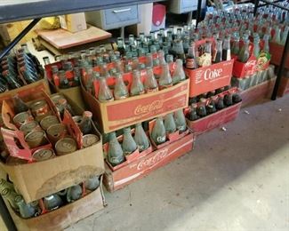 Coca-Cola Bottles and other Coca-Cola items all over this property and in the home!