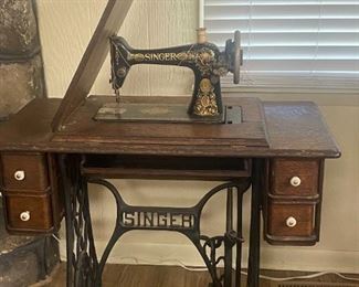 #3	Singer Treadle w/Foot Pedal In Cabinet	$95 
