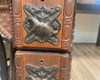 #8	Wheeler Wilson Mfg. Co. Machine in Tredle Cabinet 	 $100.00 
