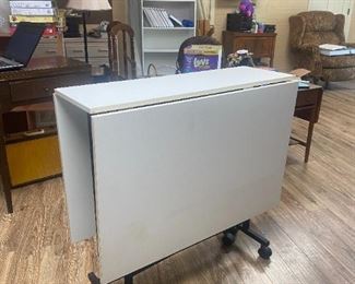 #10	Portable Rolling Cutting Table - 12-59x36x34.5	 $65.00 
