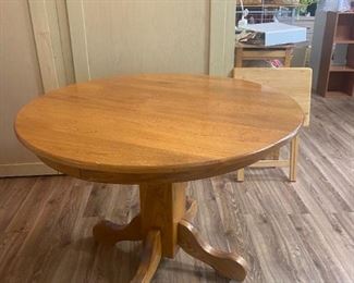 #11	Oak Table (no chairs) 42roundx30  (as is finish)	 $75.00 
