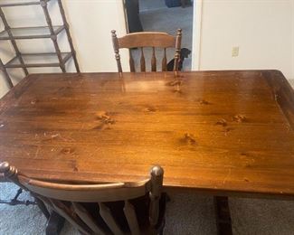 #23	Double Pedestal Trestle Table w/4 Chairs & 2 Leaves 70-100x38x28.5 (as is scratches)	 $125.00 
