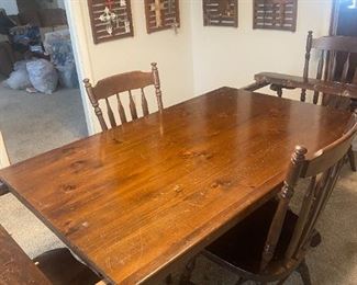 #23	Double Pedestal Trestle Table w/4 Chairs & 2 Leaves 70-100x38x28.5 (as is scratches)	 $125.00 

