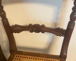 #28	(2) Antique Chairs w/cane Seating & Carved Wood Back - sold as a set	 $45.00 
