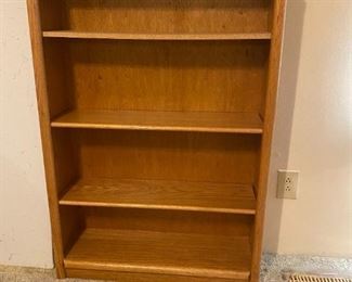 #40	4 shelf Laminate Bookcase (as is top Shelf pressed board shelf)  32.5x10x48	 $40.00 
