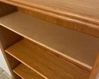 #40	4 shelf Laminate Bookcase (as is top Shelf pressed board shelf)  32.5x10x48	 $40.00 
