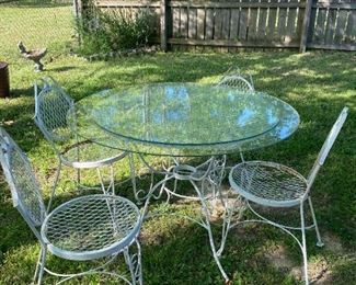 #55	Metal Table w/4 chairs (Seats as is - has wood pieces) w/Glass top - 35Dx29	 $40.00 
