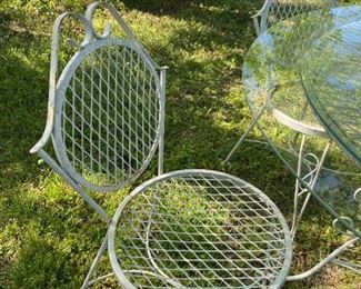 #55	Metal Table w/4 chairs (Seats as is - has wood pieces) w/Glass top - 35Dx29	 $40.00 
