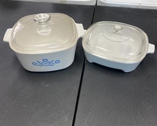 #58	Set of 2 Corning Ware Dishes w/lids - one with browining on Bottom	 $25.00 
