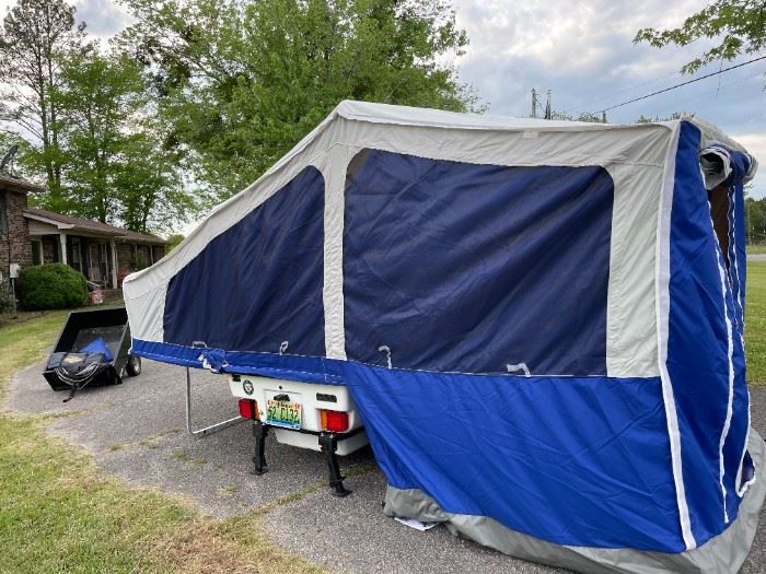 #200   Pop up Camper in excellent condition.  King Size Bed with storage under the Bed    $2500 Firm