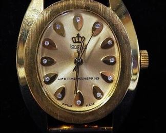 Longines Swiss Wristwatch With 14K Gold Case And 12 Clear Stones In Face
