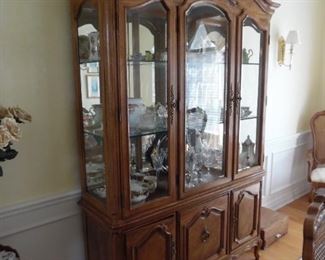 Stately china cabinet with matching table and chairs