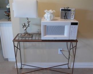 Nice glass topped sofa table and lamp, and working microwave