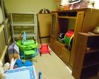 Childrens items, entertainment center and bookcases