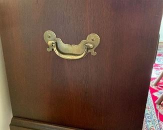 Brass handles on silver chest