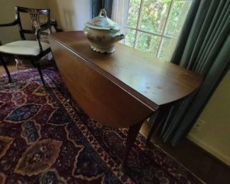 Dropleaf 19th century table (note this carpet is not included in the sale)
