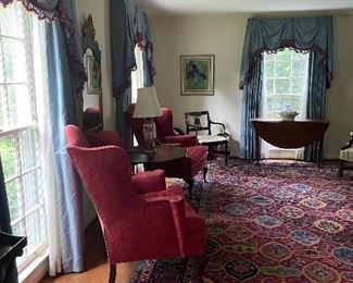 Beautiful traditional room-- please note the two large rugs on the first floor of the home are not available for sale all others are and there are a lot! 