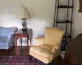 That chair and behind it is a Baker Bakers rack! 